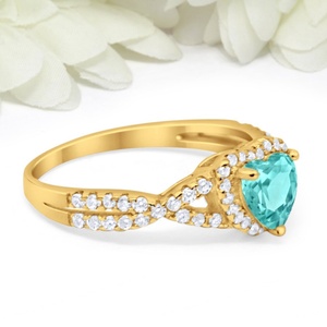 แหวนแต่งงาน/หมั้น ดีไซน์ใหม่ล่าสุด เงินแท้ S925 ประดับเพชร CZ ทรงกลม และพลอยพาราไบต์ทรงรี ดีไซน์เกลียว - Product Image 4