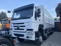 HOWOHW76 Camion benne 6X4 371HP à transmission manuelle, carrosserie large renforcée, essieu avant spécifique en acier soudé en forme de boîte