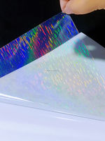 Feuille de superposition holographique imperméable A4 Film de stratification d'étoile de sable auto-adhésif Feuille supérieure transparente de photo de stratifié froid de BOPP