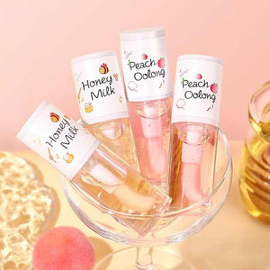 Baume à Lèvres Végétal aux Herbes Saveur Pêche Blanche Lait Miel Huile Essentielle Hydratante pour Lèvres pour Hommes Femmes Étudiants Vente en Gros avec Étiquetage - Product Image 1