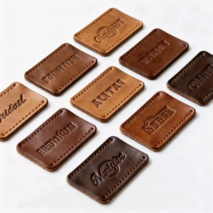 May Trên Tùy Chỉnh Thiết Kế Debossed Tên Thương Hiệu Logo Bất Chính Hãng Da Cuộn Hình Dạng Jeans Các Bản Vá Lỗi Nhãn Cho Quần Áo - Product Image 1