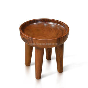Modern <b>round</b> <b>side</b> <b>table</b> featuring a unique concave design, securely displaying items with elegance; handcrafted from a single - Product Image 1