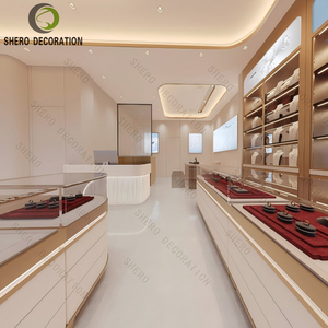ชุดตู้โชว์เคาน์เตอร์ร้านขายเครื่องประดับทองคำแบบกำหนดเอง พร้อมกระจกนิรภัย ฐานโลหะ และไฟ LED สำหรับร้านขายเครื่องประดับหรูหรา - Product Image 4