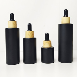 Wholesale 60ml Flat Shoulder <b>Essential</b> <b>Oil</b> Dropper Bottle Customizable Logo White Rubber Dropper Wood Grain Collar Glass Bottles - Product Image 2