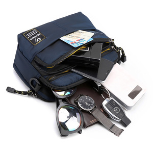 Bolso cruzado Meipower para hombre, bolso de pecho multifuncional de nailon azul real para uso diario con almacenamiento para teléfono y tarjetas - Product Image 1