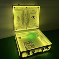 Présentoir à bouteilles LED personnalisé noir en forme de valise, avec impression billet de 100 dollars, en acrylique lumineux, pour glorifier les spiritueux, portable, pour usage en boîte de nuit