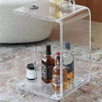 Table basse en acrylique transparente de luxe moderne sur mesure pour salon, avec roulettes, en carton, pour grossistes
