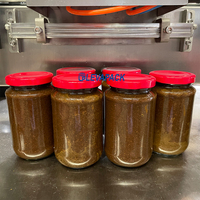 Machine de remplissage de confiture Machine d'emballage de sauce chili Machine de capsulage sous vide de bocaux en verre