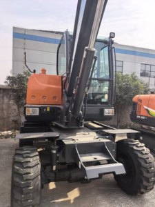 Mini-excavatrice sur roues Develon DX60W ECO 5,5 tonnes, godet de 0,18 m, système hydraulique, moteur, boîte de vitesses, pompe pour une efficacité élevée - Product Image 3