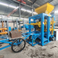 Machine automatique de fabrication de blocs creux en ciment XIANGLONG 4-26 avec moteur hydraulique et moteur 380V