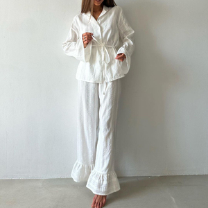 Camicetta con cintura <span class=keywords><strong>a</strong></span> balze <span class=keywords><strong>a</strong></span> forma di Anna Top e <span class=keywords><strong>pantaloni</strong></span> <span class=keywords><strong>Palazzo</strong></span> in cotone bianco Set in due pezzi da donna Set Casual da donna - Product Image 1