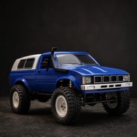 Camionnette RC Hobbi Grade 4x4 Télécommandée Tout-Terrain 2.4GHz LED 40 Min ABS+Métal Bleu Chargeur Inclus Fonction Suivez-moi