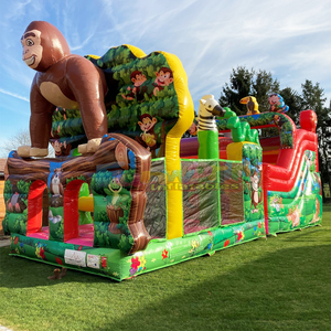 Castillo inflable comercial con temática de jungla colorida, con obstáculos y tobogán, tipo casa de brinco. - Product Image 6