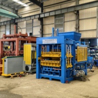 Presse à briques en ciment QT8-15 pour blocs de construction fabriqués en usine, pavés paysagers, unités murales et produits de maçonnerie en béton