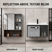 Meuble de salle de bain en aluminium alvéolé avec porte en marbre gris côtelé, miroir, lavabo en céramique, étagères ouvertes, cadre noir, poignée horizontale