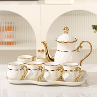 Nouvel ensemble de thé de luxe en céramique, peint à la main, doré, service à eau, théière et tasses en porcelaine pour le thé de l'après-midi, ensembles de café et de thé