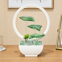 Fontaine d'eau d'intérieur en verre vert avec feuilles, fontaine de table avec lumière LED pour la décoration de la maison ou du bureau