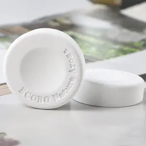 Commercio all'ingrosso personalizzato fragranza decorazione rotonda ceramica profumata gesso Aroma olio diffusore pietra deodorante per ambienti