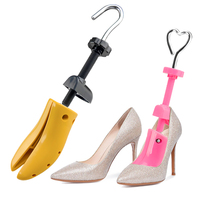 Support de chaussure en plastique civière de chaussure extenseur stéréotypes anti-rides arbre à chaussures universel mâle et femelle pieds gauche et droit