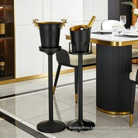 Seau à glace en acier inoxydable de style européen pour bar et KTV, avec support à vin sur pied haut, design nordique minimaliste et créatif sur le thème de l'élanchet