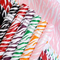 Papier d'emballage moderne à motif zèbre coloré, imperméable, durable, résistant aux déchirures, pour cadeaux de fête, cadeaux de bureau, cadeaux de fête