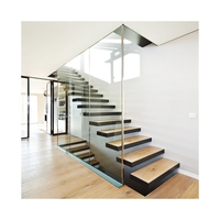 Escalier droit PRIMA avec poutre en acier au carbone pour un design d'intérieur moderne