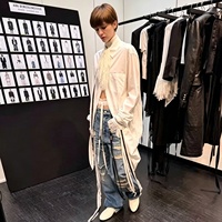 Jeans en denim délavé taille mi-haute pour hommes et femmes, style streetwear, avec franges, patchwork et rubans – Vente en gros