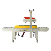 Machine de cerclage et de scellage automatique électrique à prix d'usine pour boîtes, cartons de boissons et vêtements
