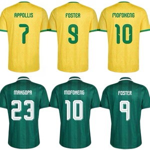 เสื้อฟุตบอลทีมชาติแอฟริกาใต้ ฤดูกาล 2026/27 แบบเหย้าและเยือน พร้อมหมายเลขและตราสโมสร ขายส่ง - Product Image 1