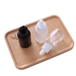 Factory Price Custom <b>Glass</b> Essence Container 30ml <b>Clear</b> <b>Glass</b> Hair Face Body Oil With 1oz <b>Glass</b> Dropper Bottle - Product Image 2
