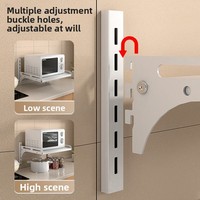 Étagère murale multifonctionnelle en métal sans poinçon pour la cuisine, le four à micro-ondes, les assaisonnements et les bouteilles.