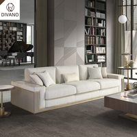 Ensemble de canapés de luxe moderne sur mesure 1+3 places en tissu avec table d'appoint intégrée pour villa et salon de direction
