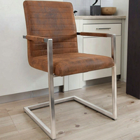 Vente en gros Loft Chaise en porte-à-faux avec accoudoirs rembourrés et cadre chromé Chaise de salle à manger Chaises de salle à manger marron vintage