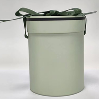 Boîte en carton cylindrique ronde de luxe personnalisée pour parfum carton ondulé avec revêtement éponge ruban décoratif emballage élégant