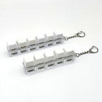 Porte-clés testeur de commutateurs mécaniques à 4 touches - Jouet anti-stress, porte-clés de clavier pour bureau et cadeaux
