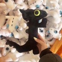 Vente en gros de poupées dragon dansantes édentées Jouets en peluche poupées dragon dansantes