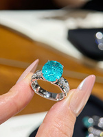 Bague de fiançailles en or 18 carats avec diamant de laboratoire bleu Paraiba taille ovale de luxe et bande pavée torsadée pour femme