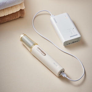 Lime à pieds électrique XZQ-S10C2 avec pierre ponce ronde pour l'élimination des callosités et le soin des pieds, alimentée par batterie, blanc cassé - Product Image 3