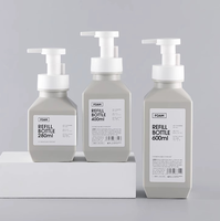 Flacon pompe en plastique PET design tendance à épaule oblique pour savon moussant et crème visage 280ml 400ml 600ml