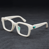 Bijoux de luxe Lunettes personnalisées en acétate rouge Monture optique pour femmes avec incrustation de pierres précieuses turquoises et détails en métal