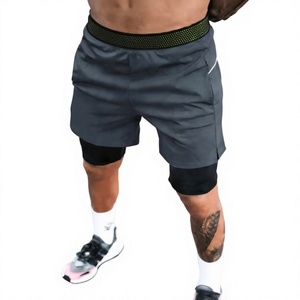 Shorts de sport pour homme de haute qualité à séchage rapide avec poches, taille élastique, longueur mi-cuisse, gris uni, en polyester, pour la course et l'entraînement - Product Image 1