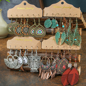 Boucles d'oreilles pendantes tendance, style bohème, plumes, alliage, ensemble de bijoux de fête pour femmes - Product Image 1