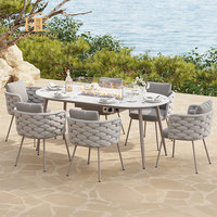 Ensemble de table à manger d'extérieur en pierre frittée de 180 cm avec 7 pièces et fauteuils en corde tressée