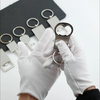 Décapsuleur porte-clés personnalisé en alliage de zinc avec logo gravé, forme cœur, pour cadeaux promotionnels de mariage
