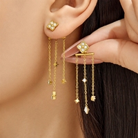 Anting-anting wanita mewah berlapis emas 18K PVD, baja anti karat 316L, desain bunga empat daun zircon, dengan detail tassel panjang, kelas atas.