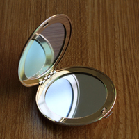 Miroir cosmétique portable pliant Miroir de poche Fer en gros Miroir cosmétique rond personnalisé Montage mural Noir