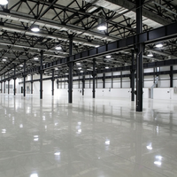 Entrepôt de stockage multifonctionnel industriel moderne à double étage en acier préfabriqué avec résistance au vent élevée