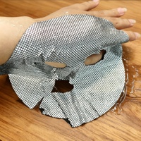 Masque facial en feuille de charbon Y559 avec matrice thermique en feuille d'argent pour soin professionnel SPA Soin De La Peau Substrate OEM