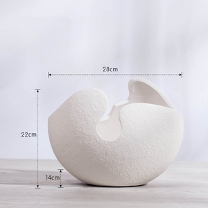 Vase à fleurs moderne en céramique blanche, design abstrait effet coquille d'œuf, finition mate, pour décoration de centre de table de mariage, style minimaliste, nouveau modèle. - Product Image 6