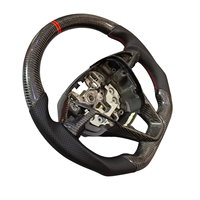 Personnalisation des améliorations automobiles, cuir perforé en fibre de carbone de qualité supérieure pour le volant de voiture Ford Mondeo